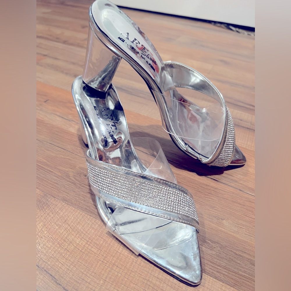 Brand new sandals, size 8, bought them in Europe and never wore them.